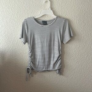 Black and white striped shirt with laces on the bottom , size-xS